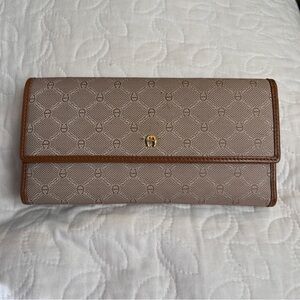 Like new Etienne Aigner Brown Pattern Wallet w/ leather interior and checkbook